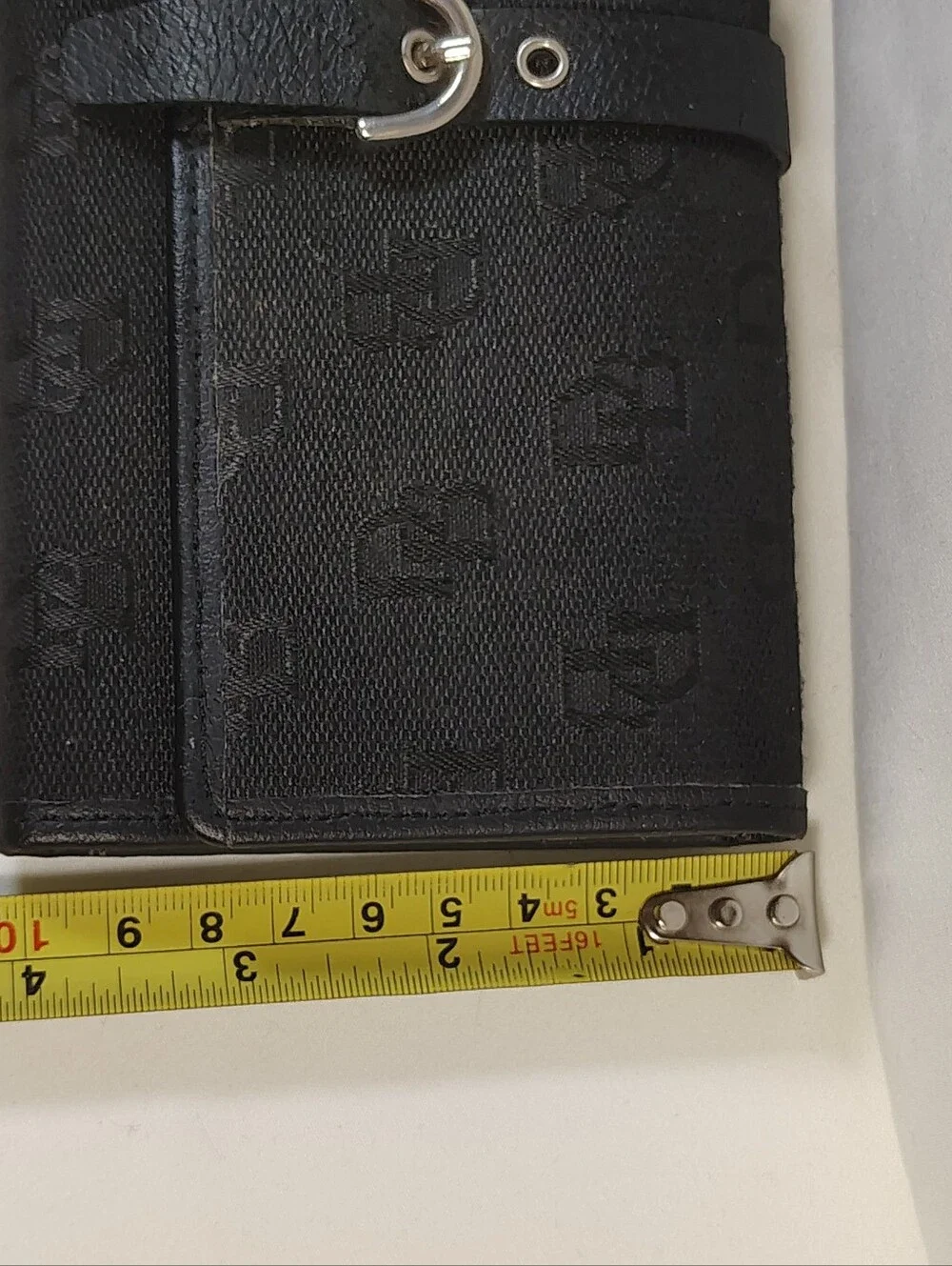 Dooney & Bourke Black triple bi fold wallet